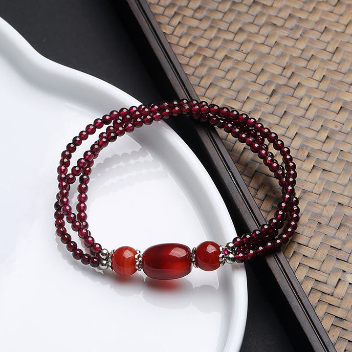 Bracelet triple couche de protection en grenat naturel et agate rouge de Buddha Stones