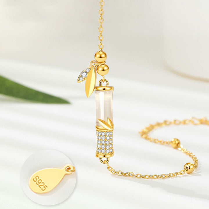 Bracelet porte - bonheur en argent sterling 925 plaqué or 18 carats avec jade blanc et bambou et zircon - image 4