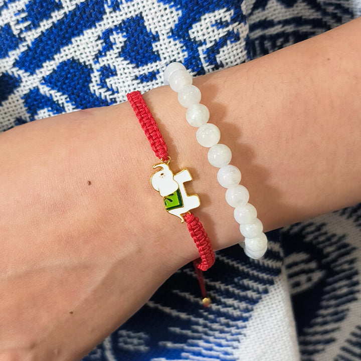 Bracelet tibétain en argent sterling 925 fait main avec des Buddha Stones et un éléphant porte-bonheur rouge