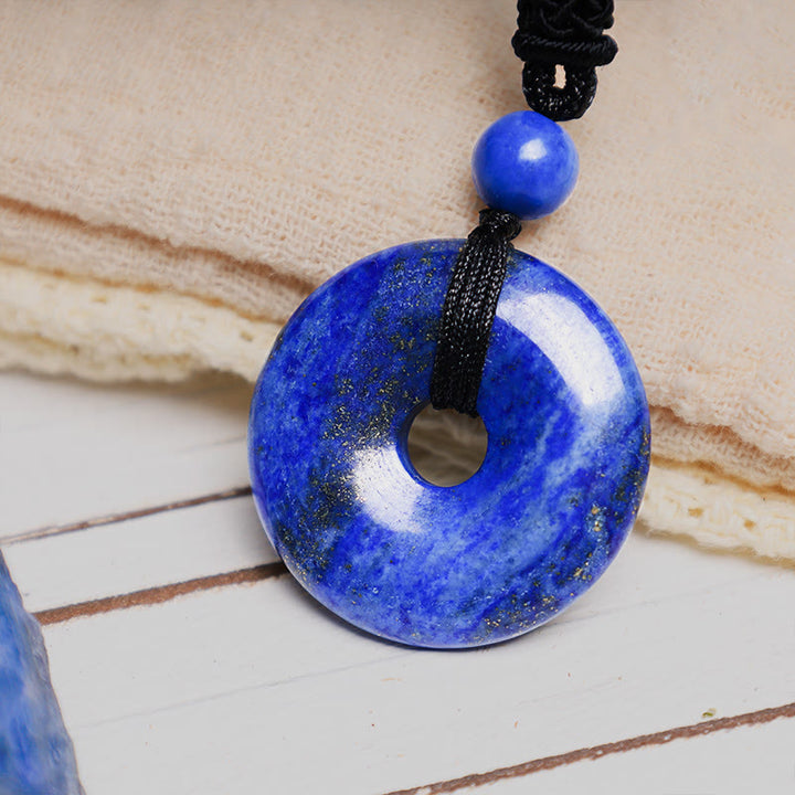 Collier avec pendentif porte-bonheur en Buddha Stones précieuses en cristal de guérison