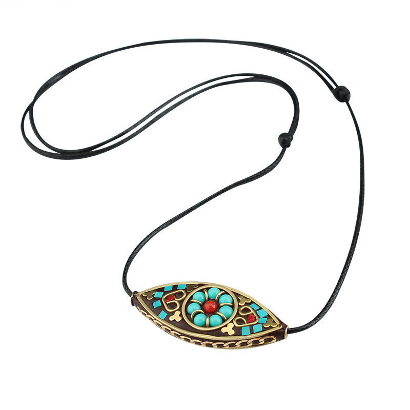 Collier pendentif en perles turquoises du Tibet avec Buddha Stones et motif marquise, protection et force