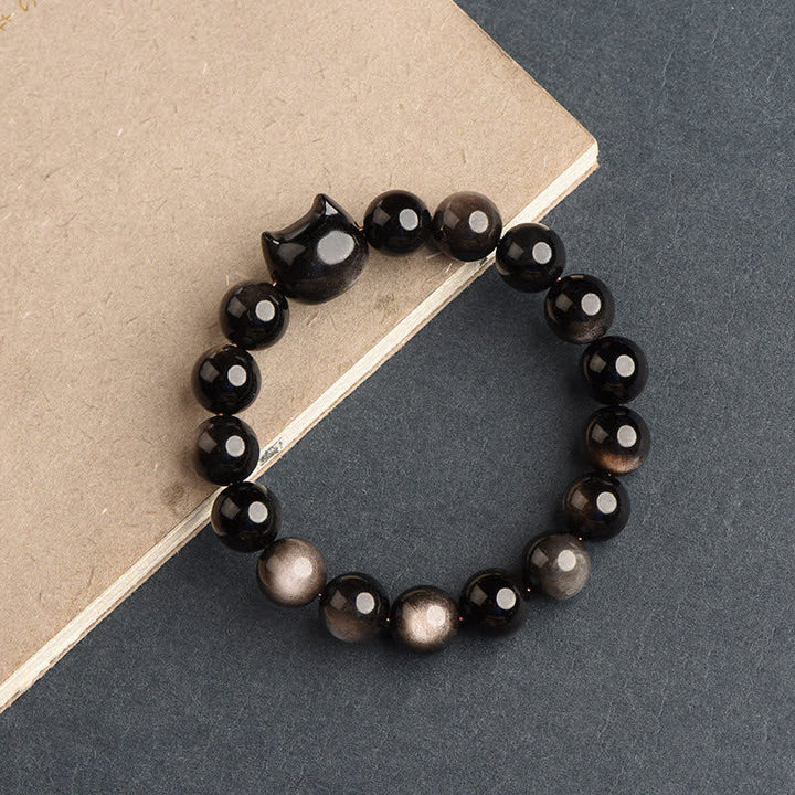 Bracelet de protection porte-bonheur en obsidienne dorée et argentée avec Buddha Stones et jolie patte de chat porte-bonheur - Obsidienne argentée - Tête de chat - 8 mm - image 29
