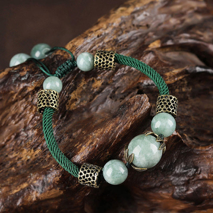 Bracelet de prospérité en perles de jade et corde verte fait main avec Buddha Stones