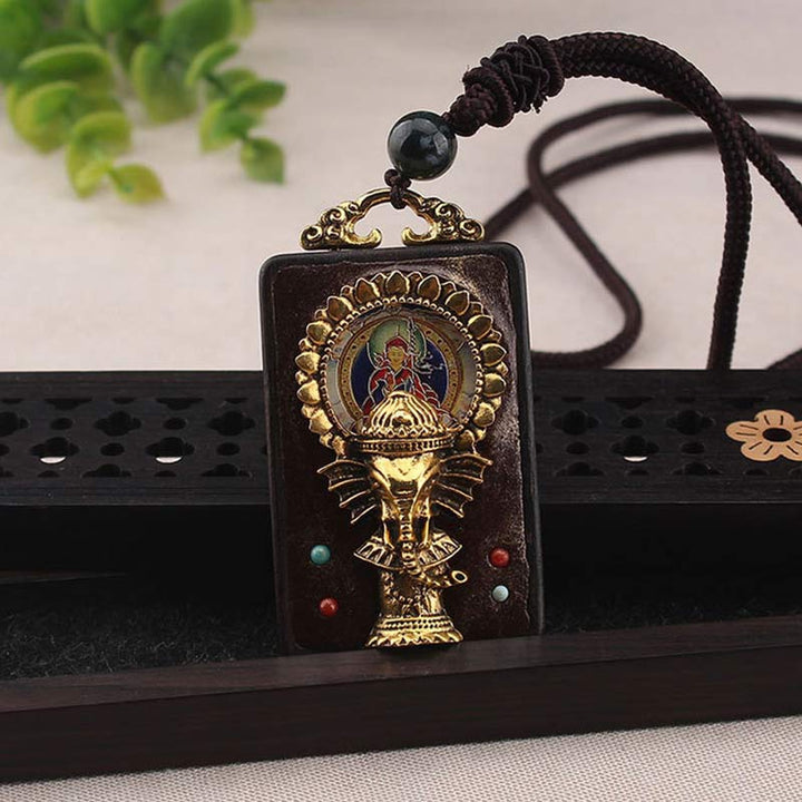 Collier avec pendentif en corde représentant un éléphant en bois d'ébène, dieu de la fortune et de la bénédiction du Bouddha