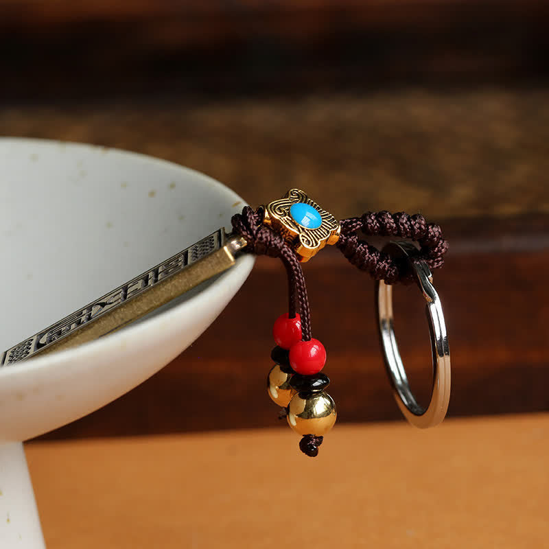 Porte-clés avec bénédiction de la paix Namo Amitabha