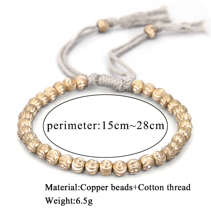 Bracelet porte-bonheur en perles de cuivre tibétaines faites à la main avec Buddha Stones