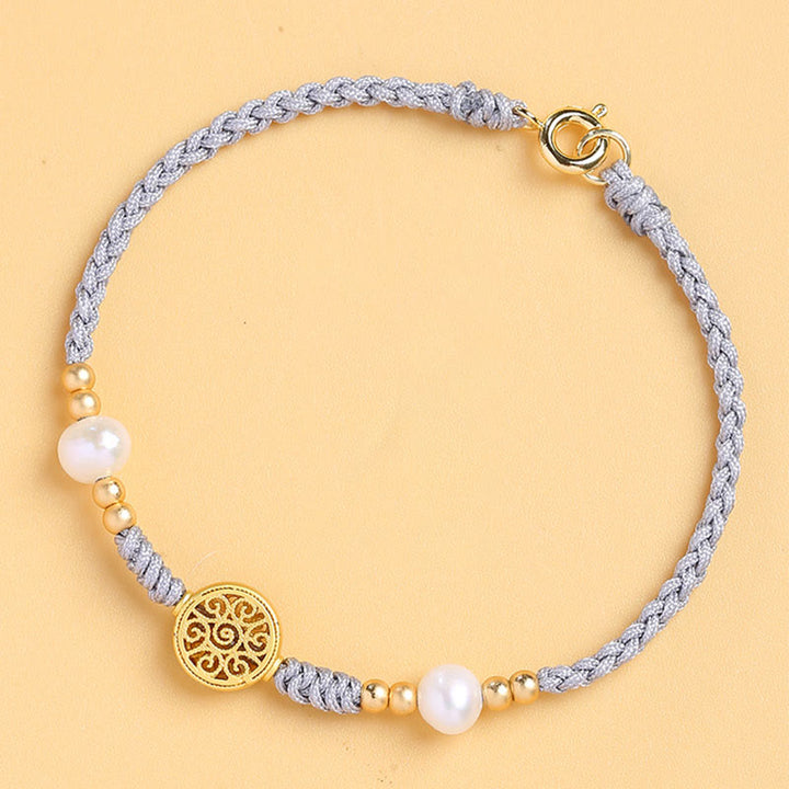 Bracelet tressé en corde bleue avec perles et arbre de fortune en cuivre et Buddha Stones