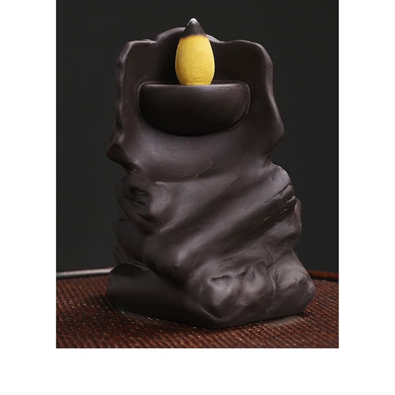 Brûleur d'encens de guérison en argile violette avec tête de mort en Buddha Stones pour Halloween
