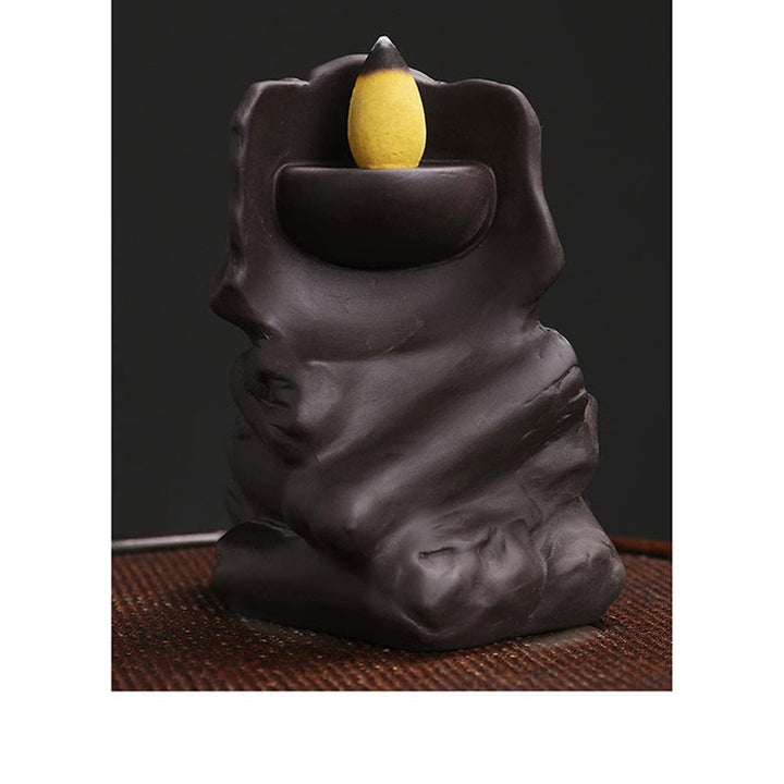 Brûleur d'encens de guérison en argile violette avec tête de mort en Buddha Stones pour Halloween