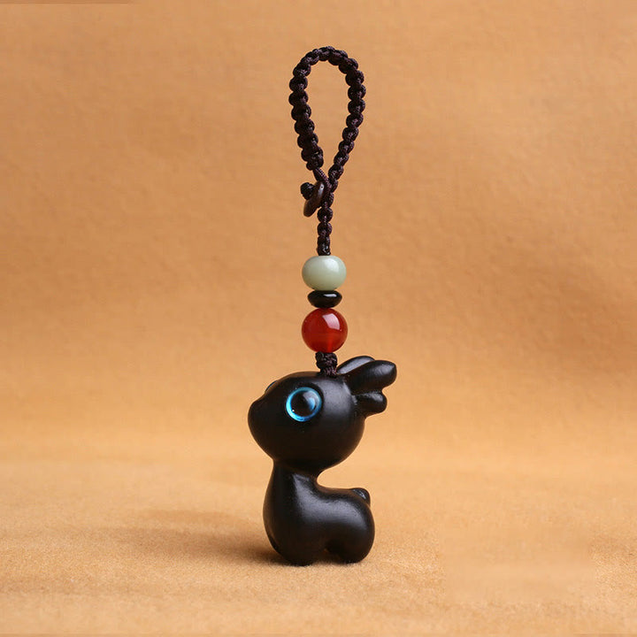Buddha Stones de santal Petite feuille Bois de santal rouge Bois d'ébène Bois de santal vert Porte-bonheur Mini cerf sculpté Protection Porte-clés Décoration à suspendre pour téléphone