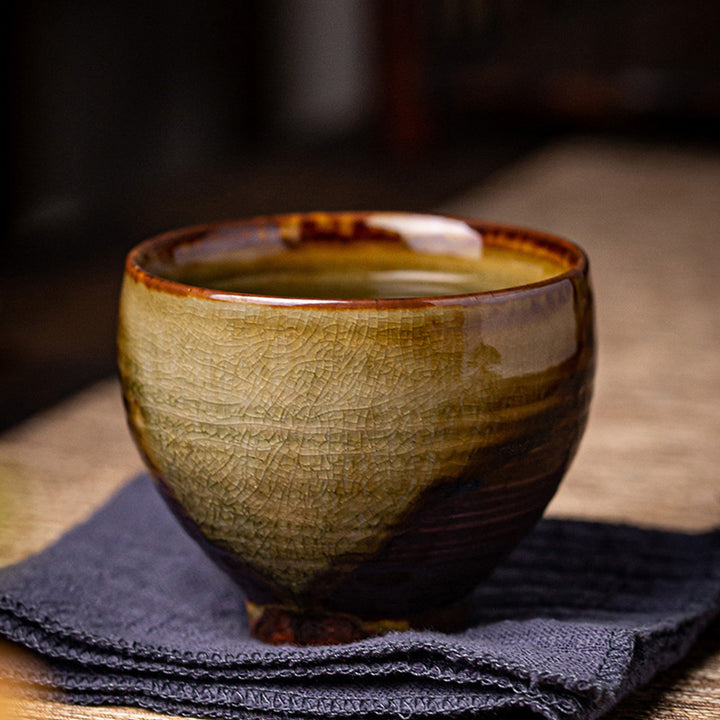 Tasse à thé en céramique rétro Buddha Stones et changement de four marron Tasse à thé Kung Fu
