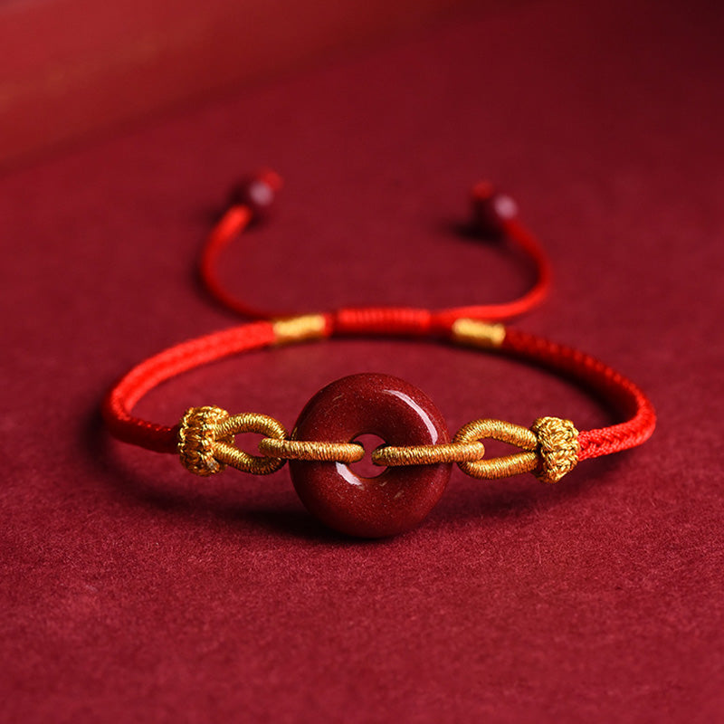 Bracelet tressé à la main en cinabre avec boucle de paix et concentration de Buddha Stones