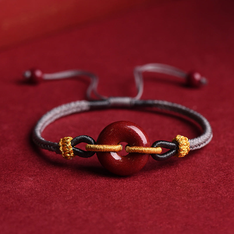Bracelet tressé à la main en cinabre avec boucle de paix et concentration de Buddha Stones