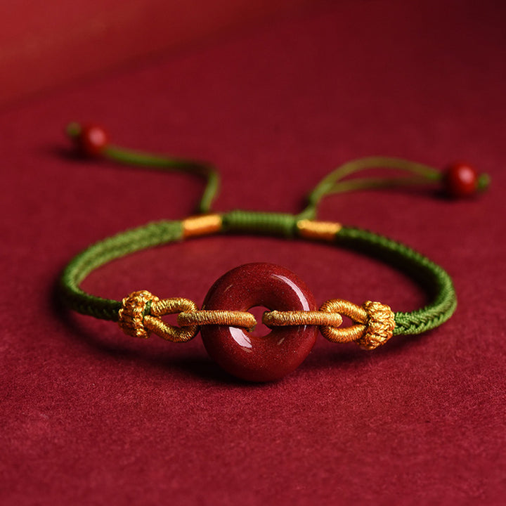 Bracelet tressé à la main en cinabre avec boucle de paix et concentration de Buddha Stones
