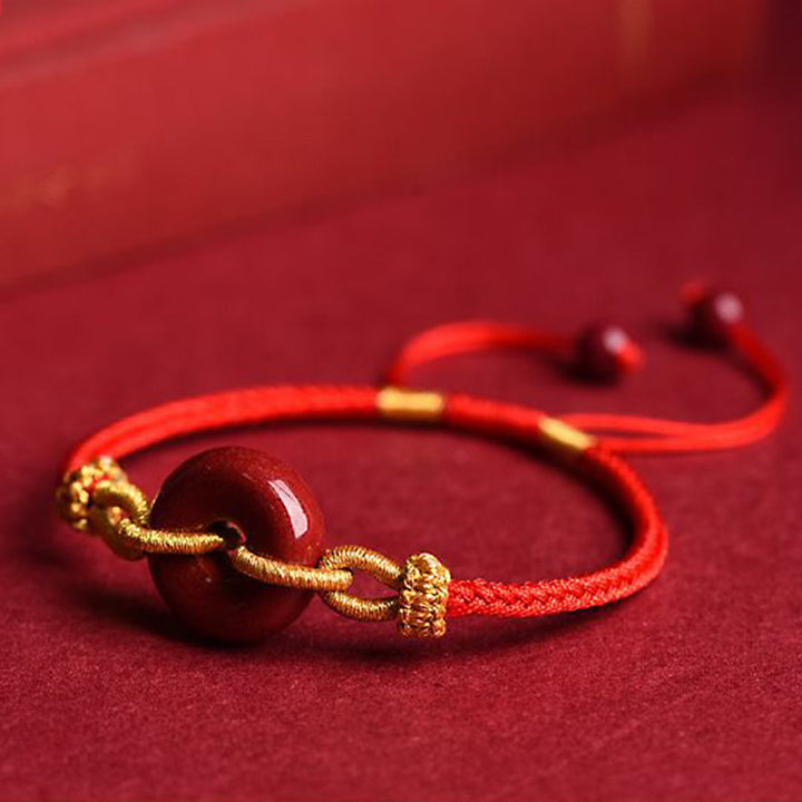 Bracelet tressé à la main en cinabre avec boucle de paix et concentration de Buddha Stones