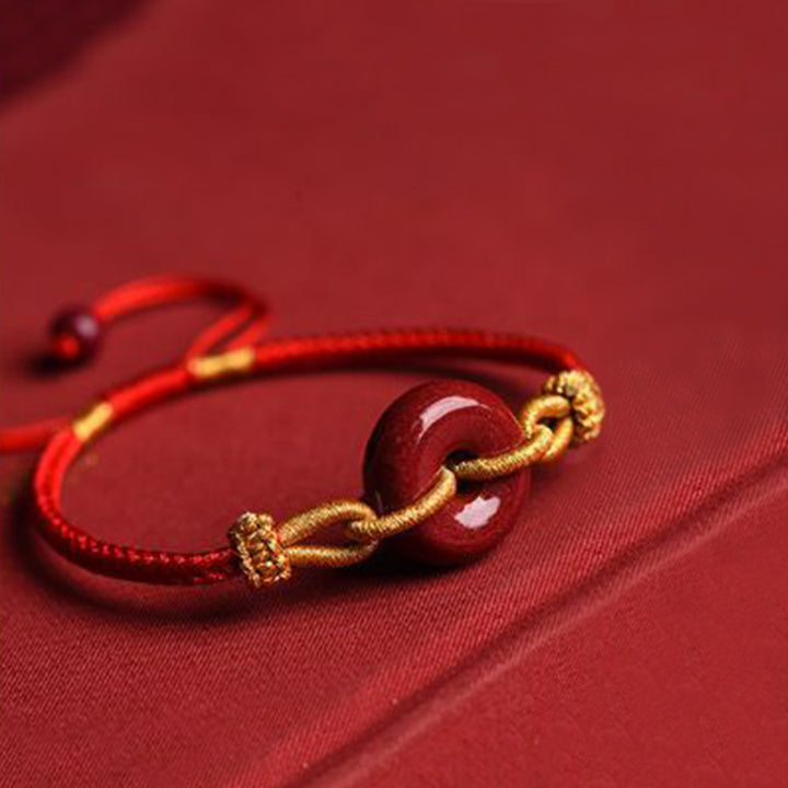 Bracelet tressé à la main en cinabre avec boucle de paix et concentration de Buddha Stones