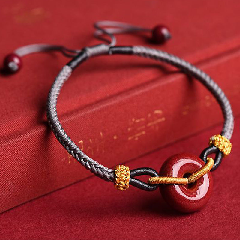 Bracelet tressé à la main en cinabre avec boucle de paix et concentration de Buddha Stones