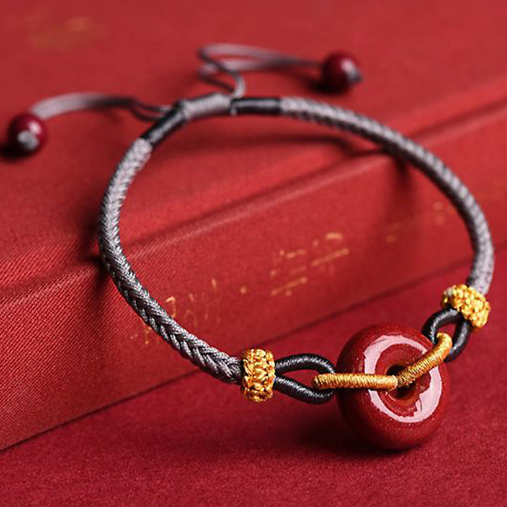 Bracelet tressé à la main en cinabre avec boucle de paix et concentration de Buddha Stones