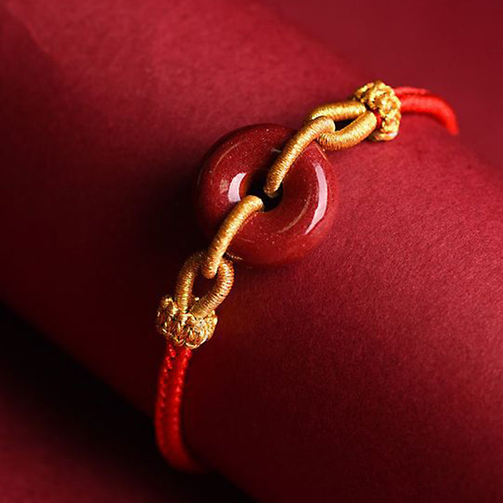 Bracelet tressé à la main en cinabre avec boucle de paix et concentration de Buddha Stones