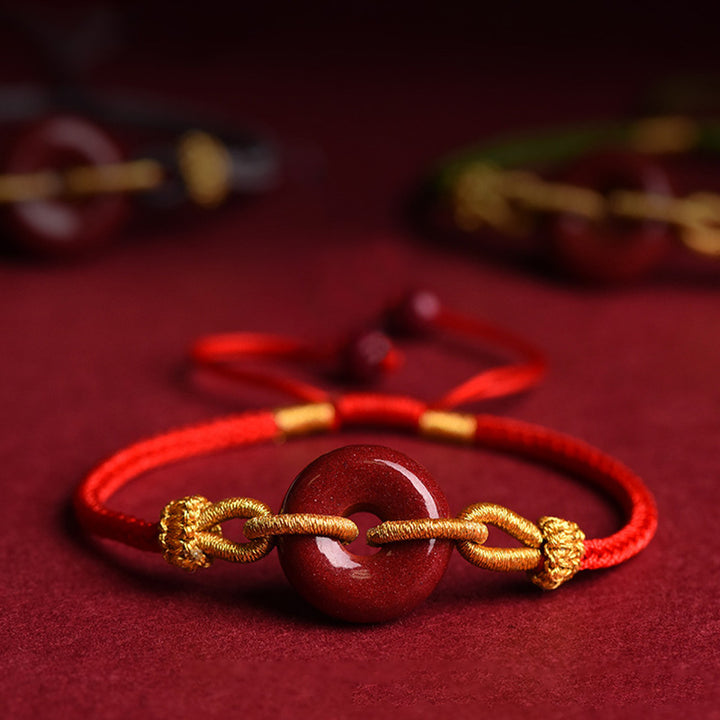 Bracelet tressé à la main en cinabre avec boucle de paix et concentration de Buddha Stones