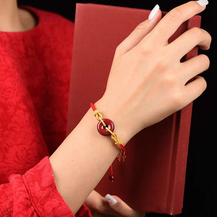 Bracelet tressé à la main en cinabre avec boucle de paix et concentration de Buddha Stones