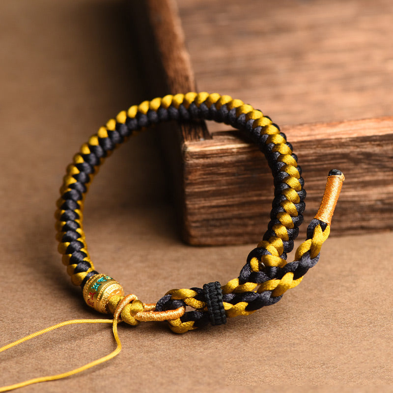 Bracelet en corde écailles de dragon tibétain en or noir fait main avec Buddha Stones Om Mani Padme Hum Pureté