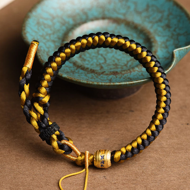 Bracelet en corde écailles de dragon tibétain en or noir fait main avec Buddha Stones Om Mani Padme Hum Pureté