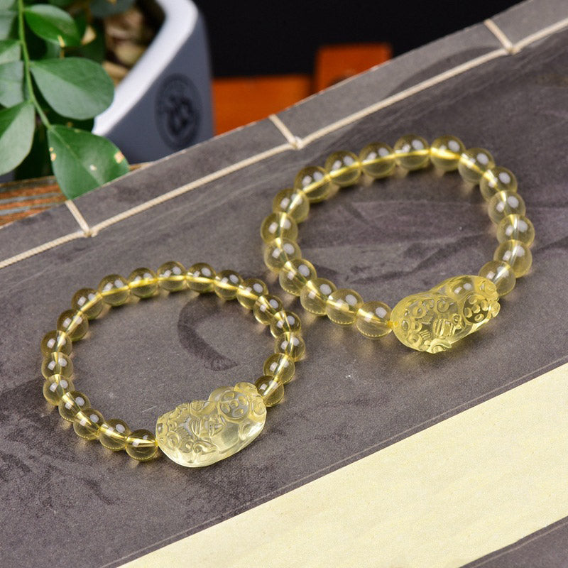 Bracelet de richesse FengShui en Buddha Stones et citrine PiXiu