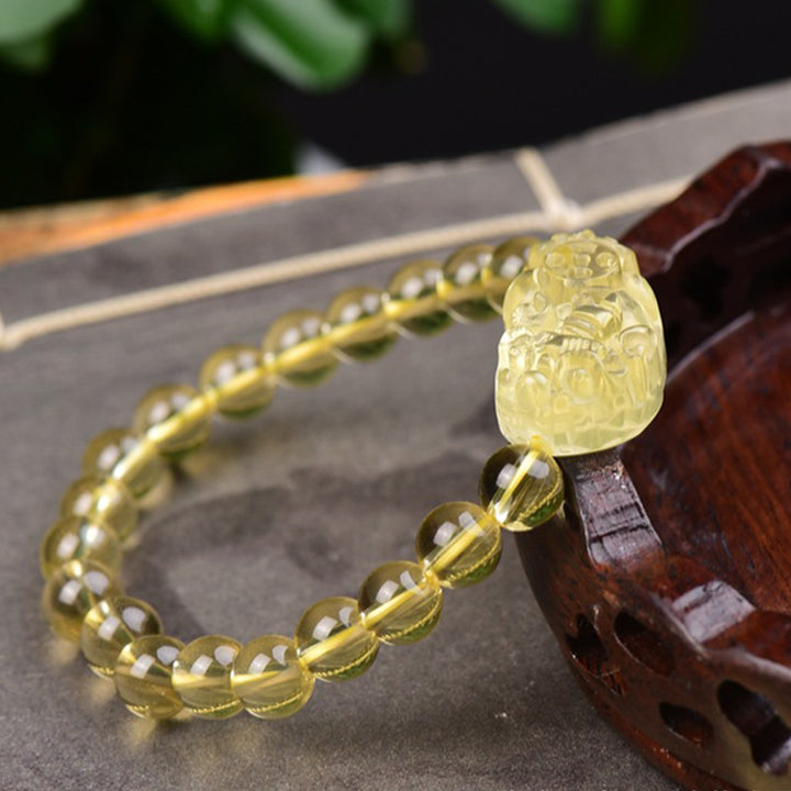Bracelet de richesse FengShui en Buddha Stones et citrine PiXiu