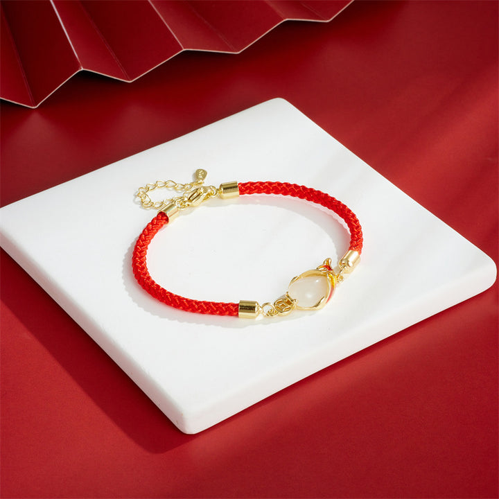 Collier pendentif porte-bonheur en calcédoine et Buddha Stones