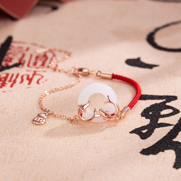 Bracelet porte-bonheur en jade blanc avec double poisson koï et pierres de Buddha Stones
