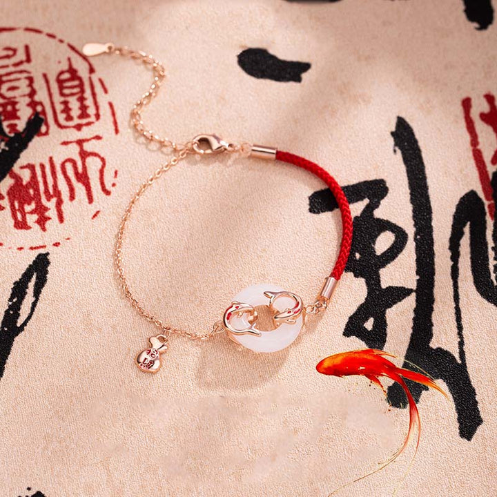 Bracelet porte-bonheur en jade blanc avec double poisson koï et pierres de Buddha Stones