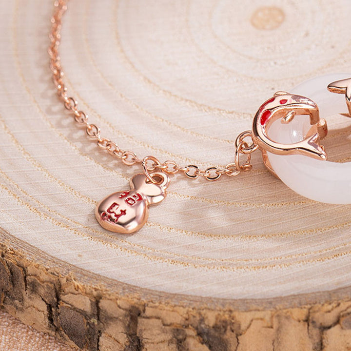 Bracelet porte-bonheur en jade blanc avec double poisson koï et pierres de Buddha Stones