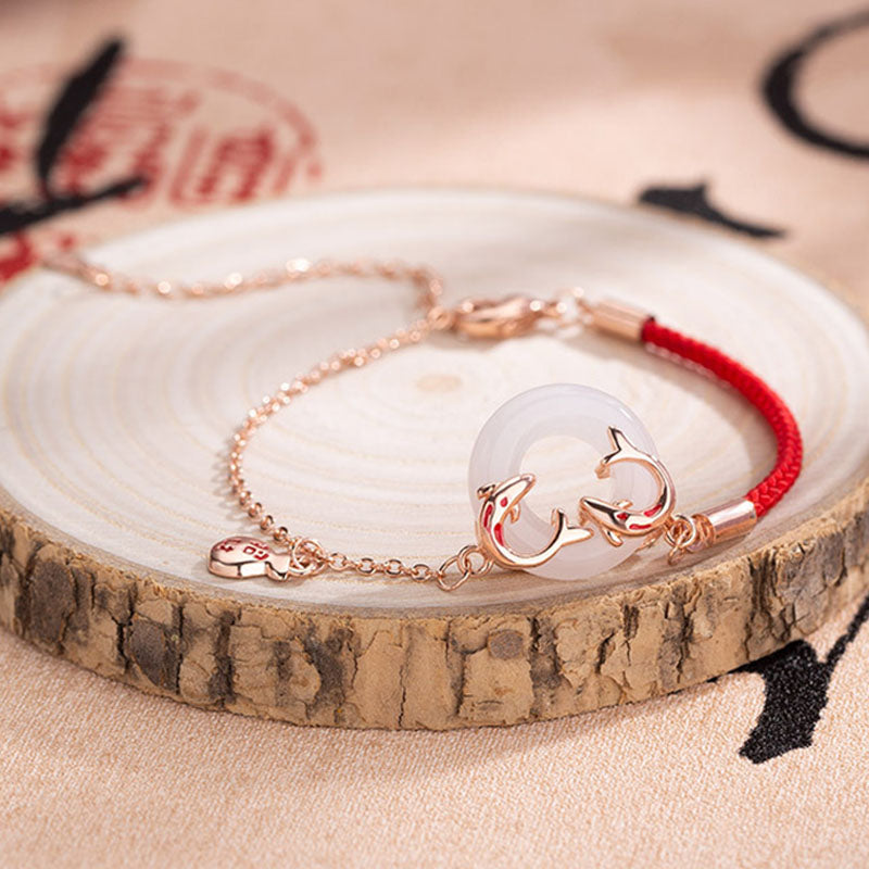 Bracelet porte-bonheur en jade blanc avec double poisson koï et pierres de Buddha Stones
