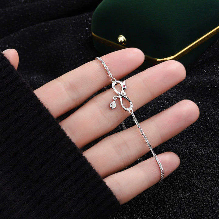 Bracelet de protection porte-bonheur en argent sterling 999 avec pendentif en forme de queue de nœud sans fin en zircon et Buddha Stones Année du Dragon