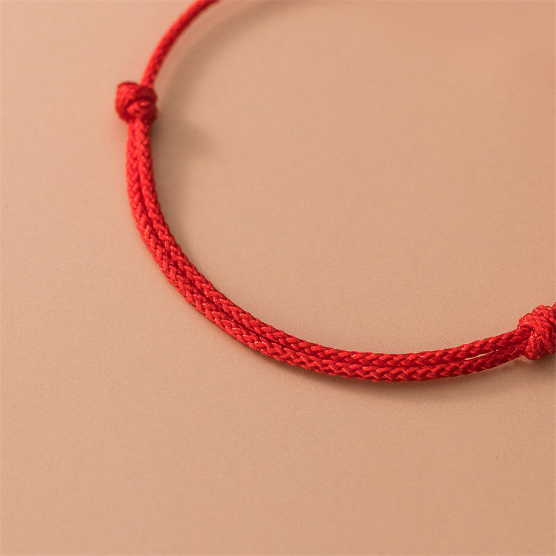 Bracelet en corde rouge avec trèfle à quatre feuilles en argent sterling 925 de Buddha Stones