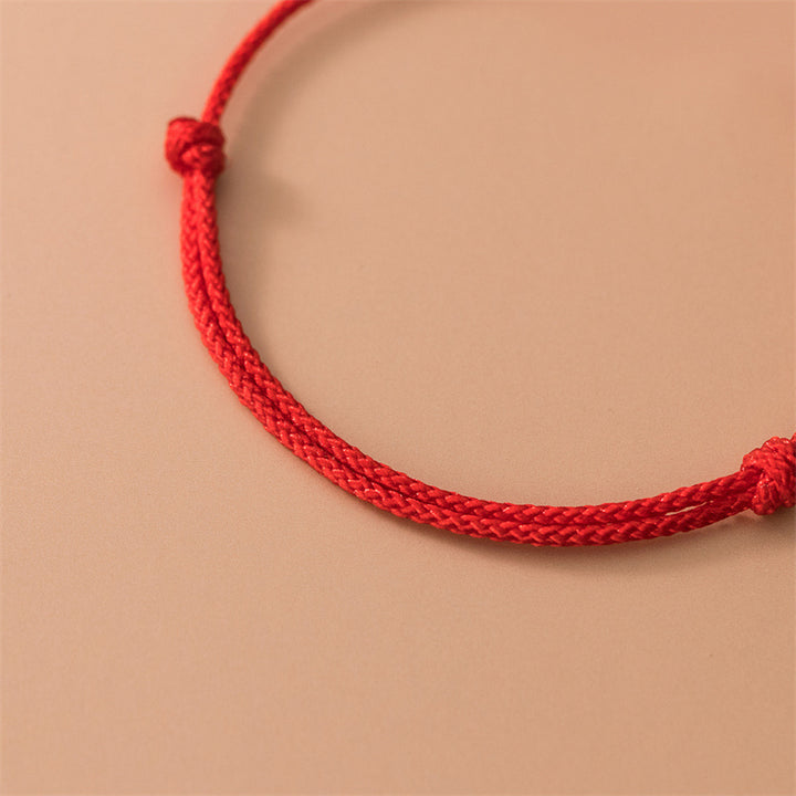Bracelet en corde rouge avec trèfle à quatre feuilles en argent sterling 925 de Buddha Stones