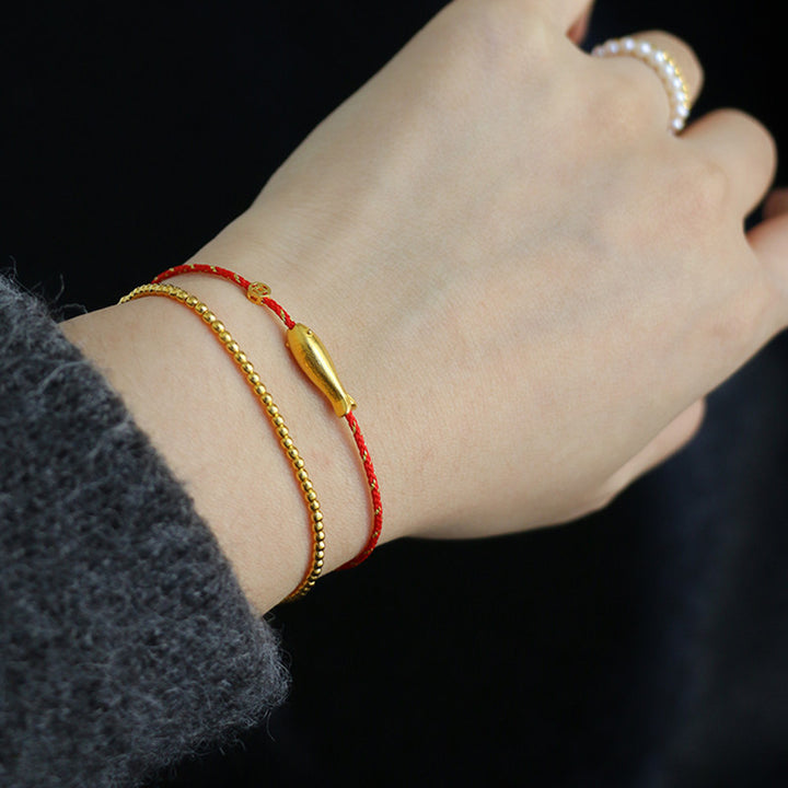 Bracelet tressé en plaqué or 14 carats avec poisson Koi et Buddha Stones