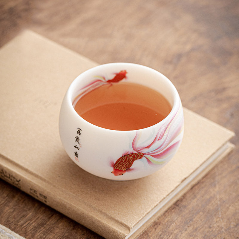 Tasse à thé en céramique blanche en porcelaine avec Buddha Stones