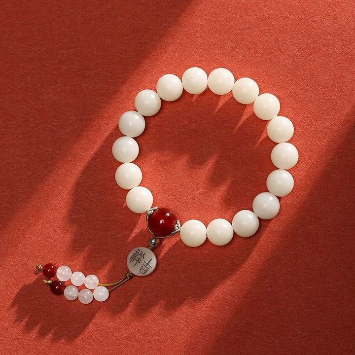 Bracelet Mala en Buddha Stones et graines de Bodhi, agate rouge, obsidienne noire, cristal rose, quartz rutile, paix