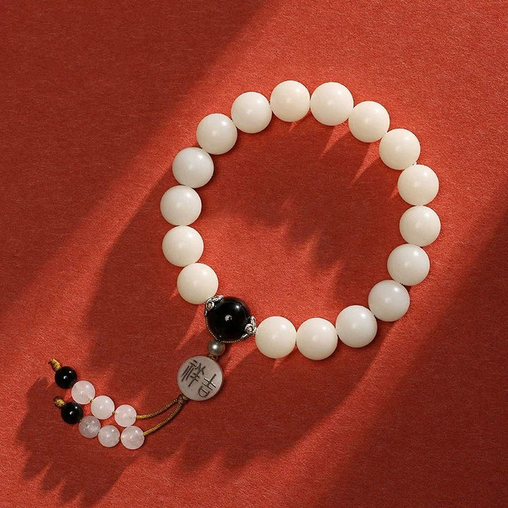 Bracelet Mala en Buddha Stones et graines de Bodhi, agate rouge, obsidienne noire, cristal rose, quartz rutile, paix