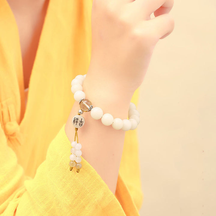Bracelet Mala en Buddha Stones et graines de Bodhi, agate rouge, obsidienne noire, cristal rose, quartz rutile, paix