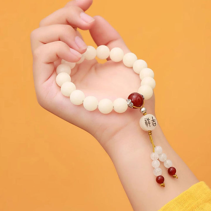 Bracelet Mala en Buddha Stones et graines de Bodhi, agate rouge, obsidienne noire, cristal rose, quartz rutile, paix