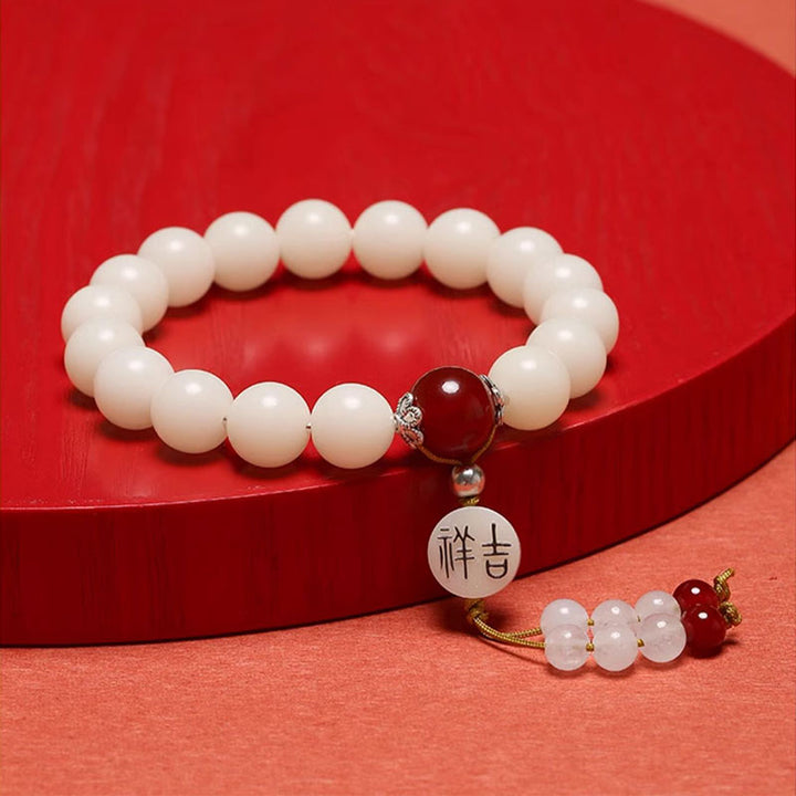 Bracelet Mala en Buddha Stones et graines de Bodhi, agate rouge, obsidienne noire, cristal rose, quartz rutile, paix