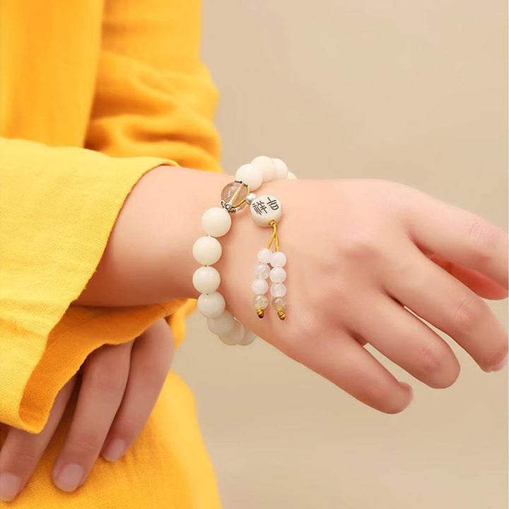 Bracelet Mala en Buddha Stones et graines de Bodhi, agate rouge, obsidienne noire, cristal rose, quartz rutile, paix
