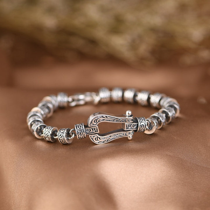 Bracelet porte-bonheur en cuivre avec motif floral de la dynastie Tang et Buddha Stones