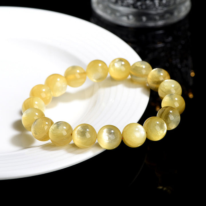 Bracelet de protection et de prospérité en lépidolite dorée naturelle de Buddha Stones