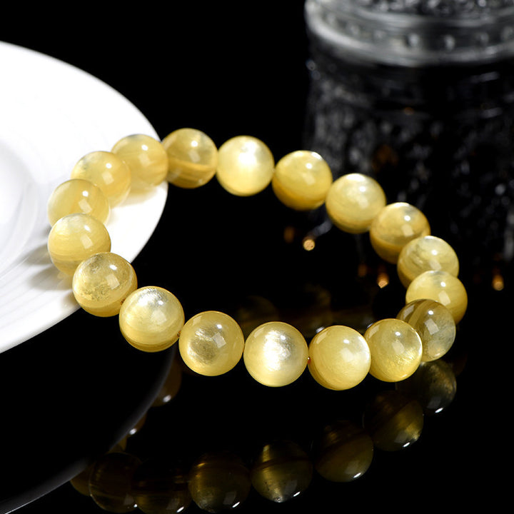 Bracelet de protection et de prospérité en lépidolite dorée naturelle de Buddha Stones