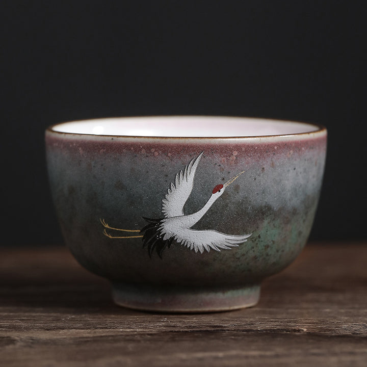 Tasse à thé en céramique avec grue de bon augure et Buddha Stones