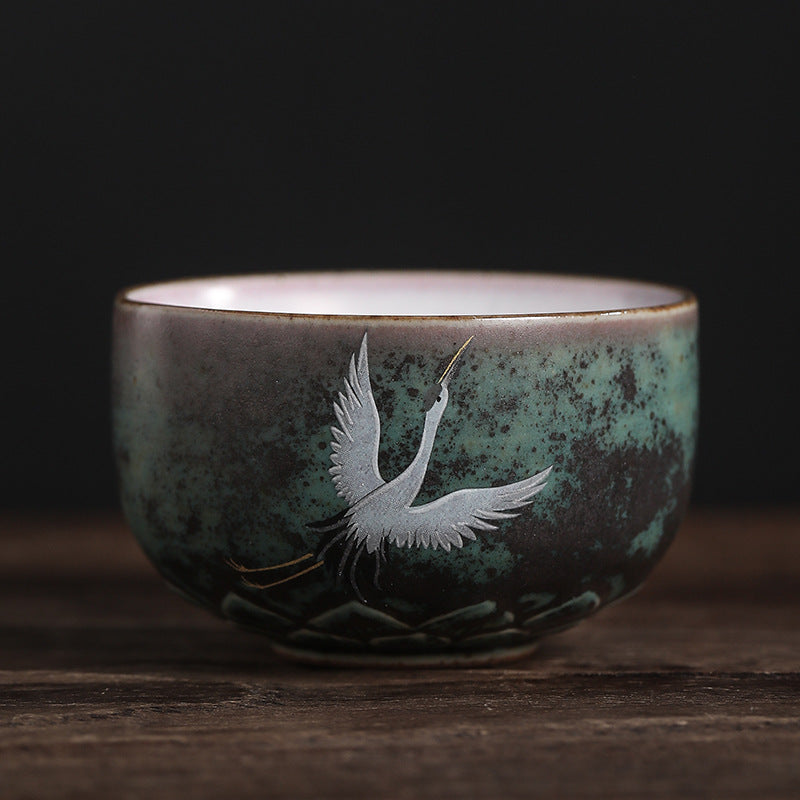 Tasse à thé en céramique avec grue de bon augure et Buddha Stones